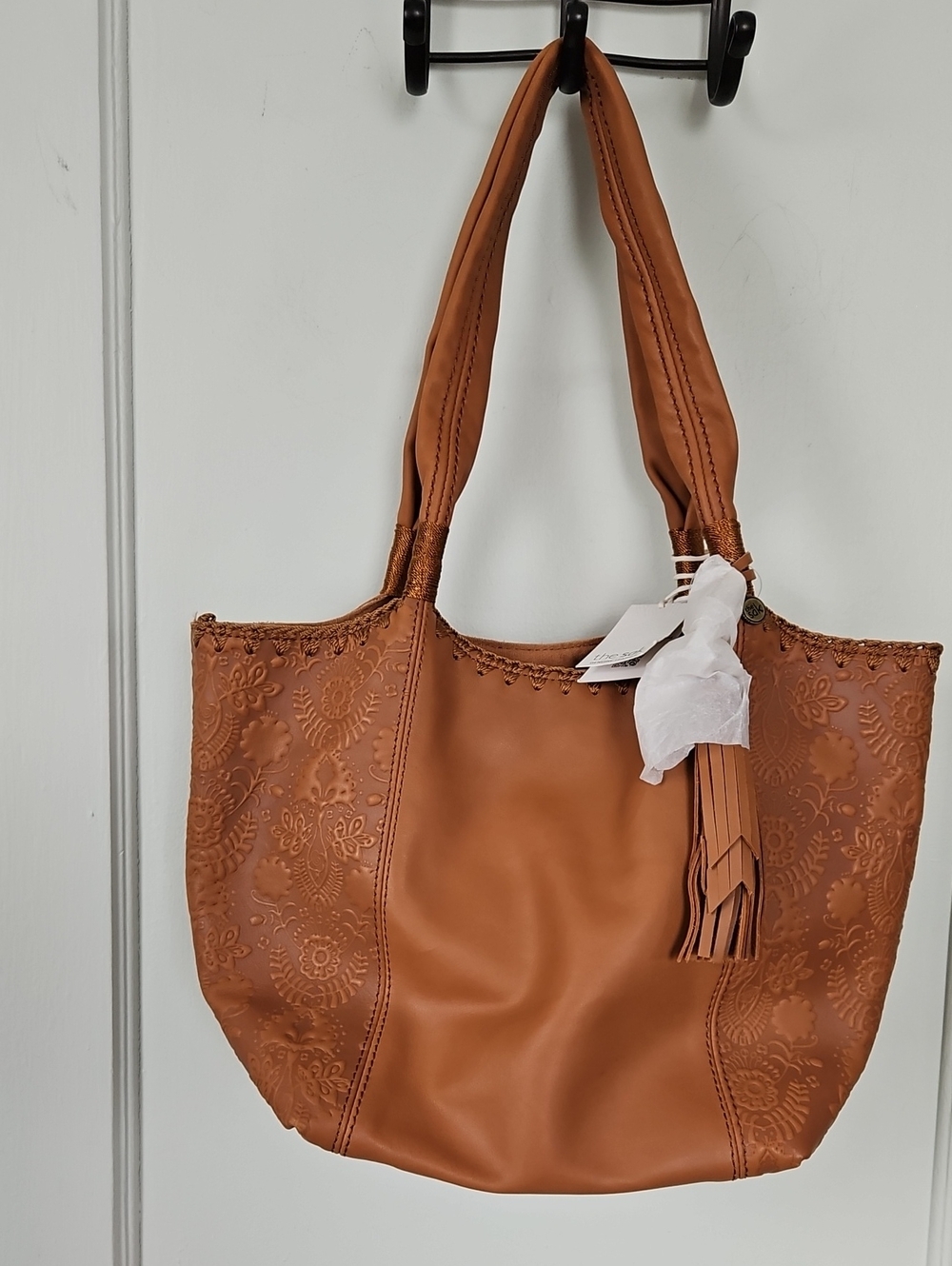 NWT The Sak Fernwood Tote in tobacco with floral Embossed Leather & Tassel